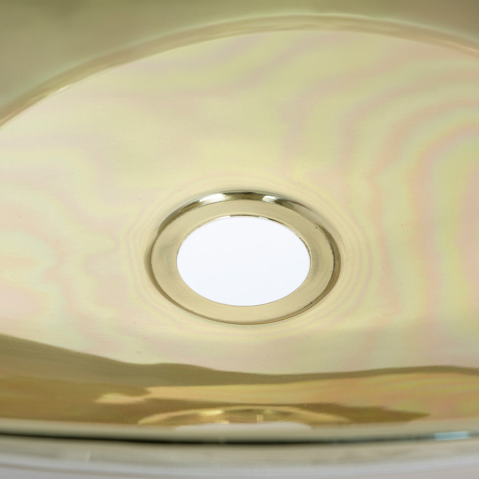 SHOW Close Up of Smooth Oval Sink in Smooth Brass